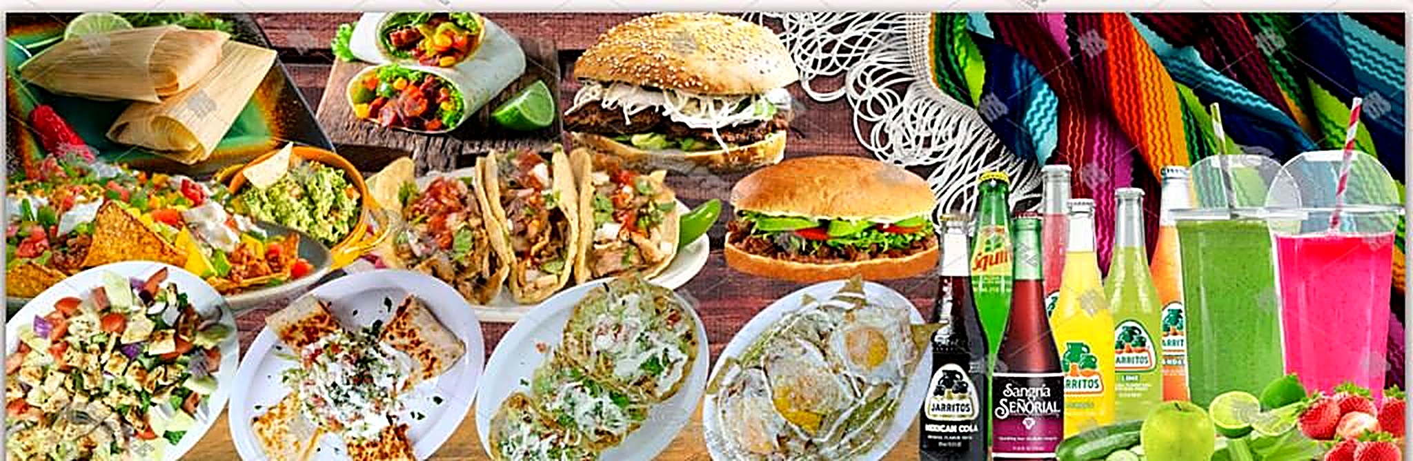A spread of El Mariachi dishes — tamales, tacos, tortas, quesadillas, fresh salads, a burger and Jarritos sodas.